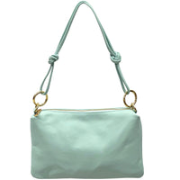 Light blue handbag with a strap on a white background