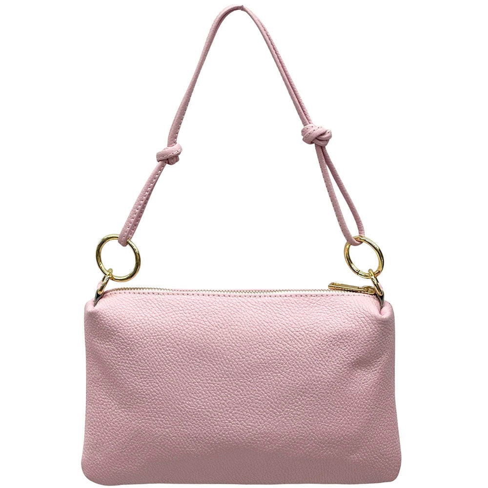 Pink handbag with a strap on a white background