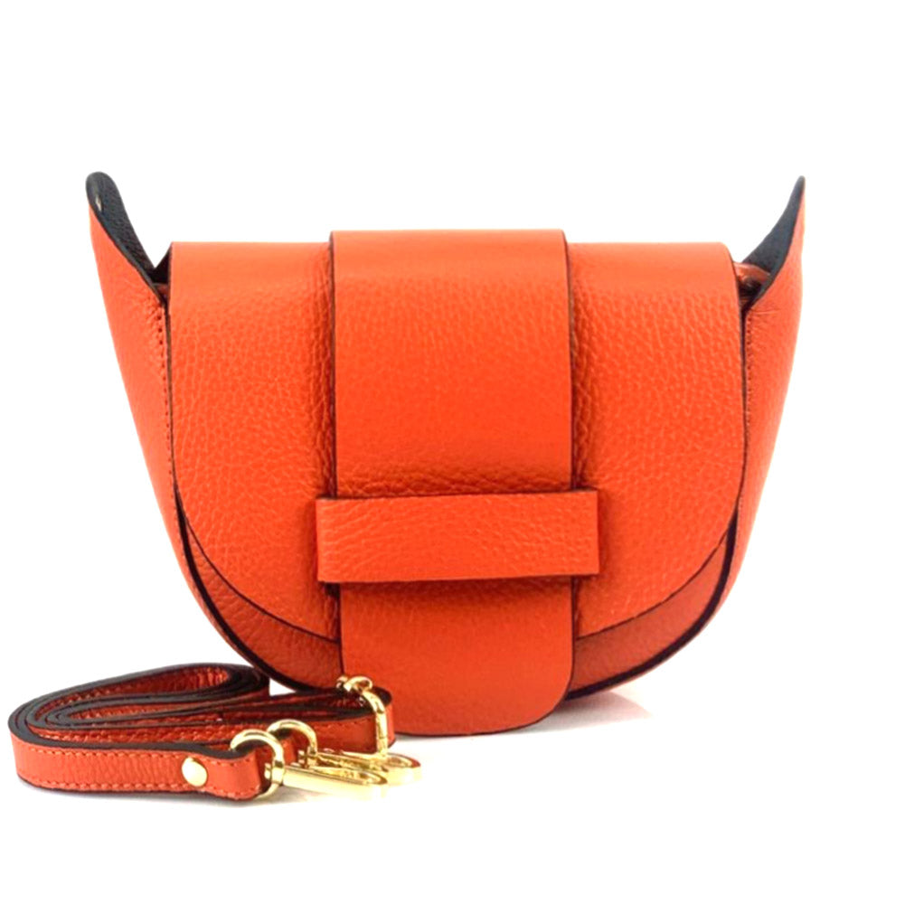 Orange Liliana leather cross-body bag with white background